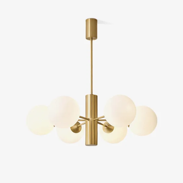 Modern brass chandelier with 8 opal borosilicate glass globes hanging over a dining table