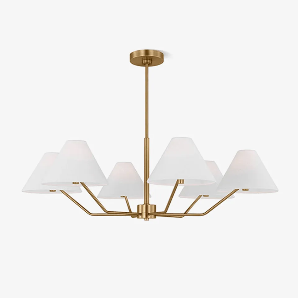 Modern fabric chandelier with 6 white shades and brass frame on a dark background