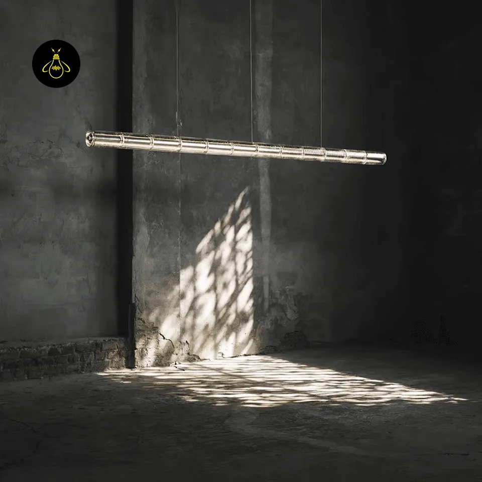 Glass Tube Chandelier – 6 Segmented Glass Tubes, Chrome Finish, 125 cm 2 Segmented glass linear chandelier with chrome bar suspended in a dark contemporary interior
