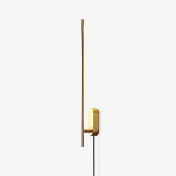 Brass wall sconce front view: a slim 60 cm LED stick on an oval backplate with a black cord, on a white background