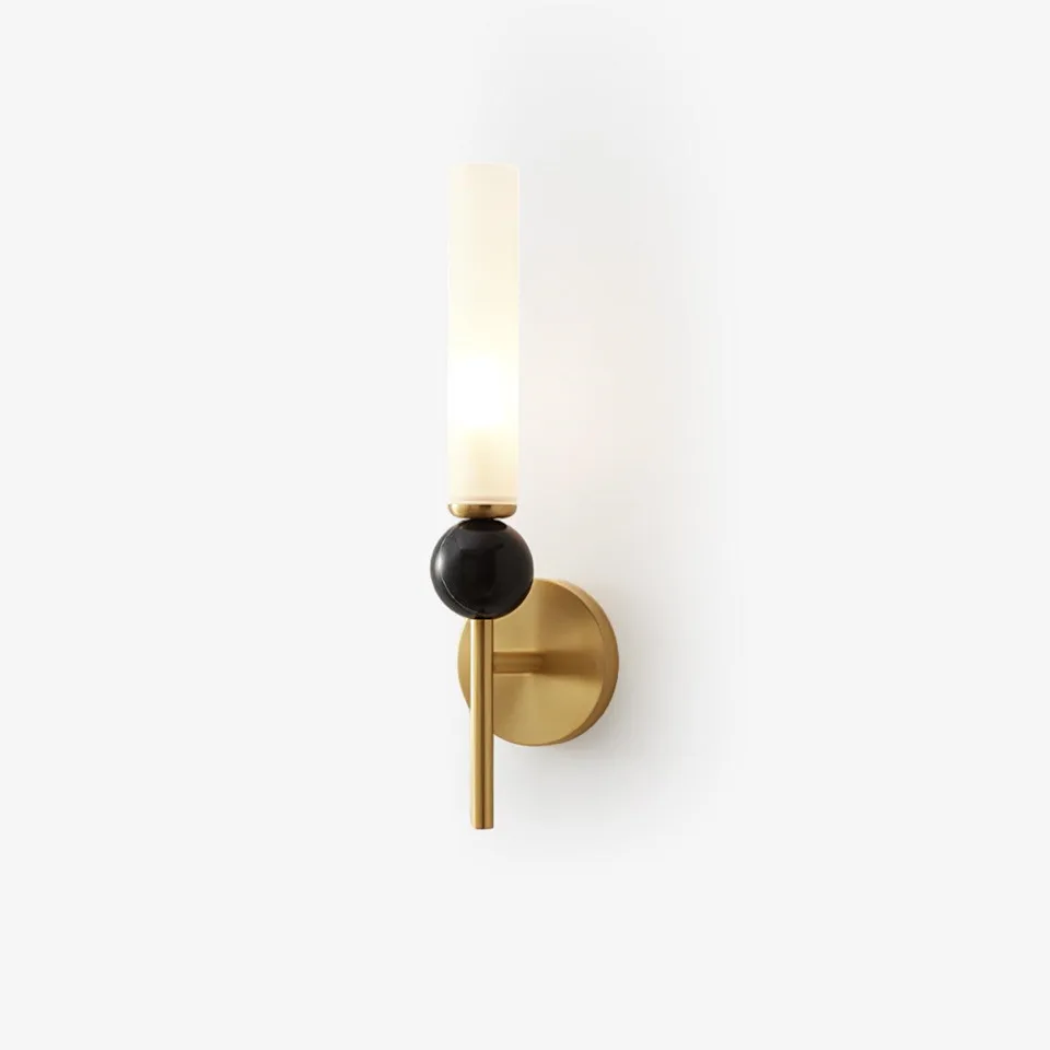 Marble wall sconce front view with black marble sphere, brass arm and acrylic diffuser