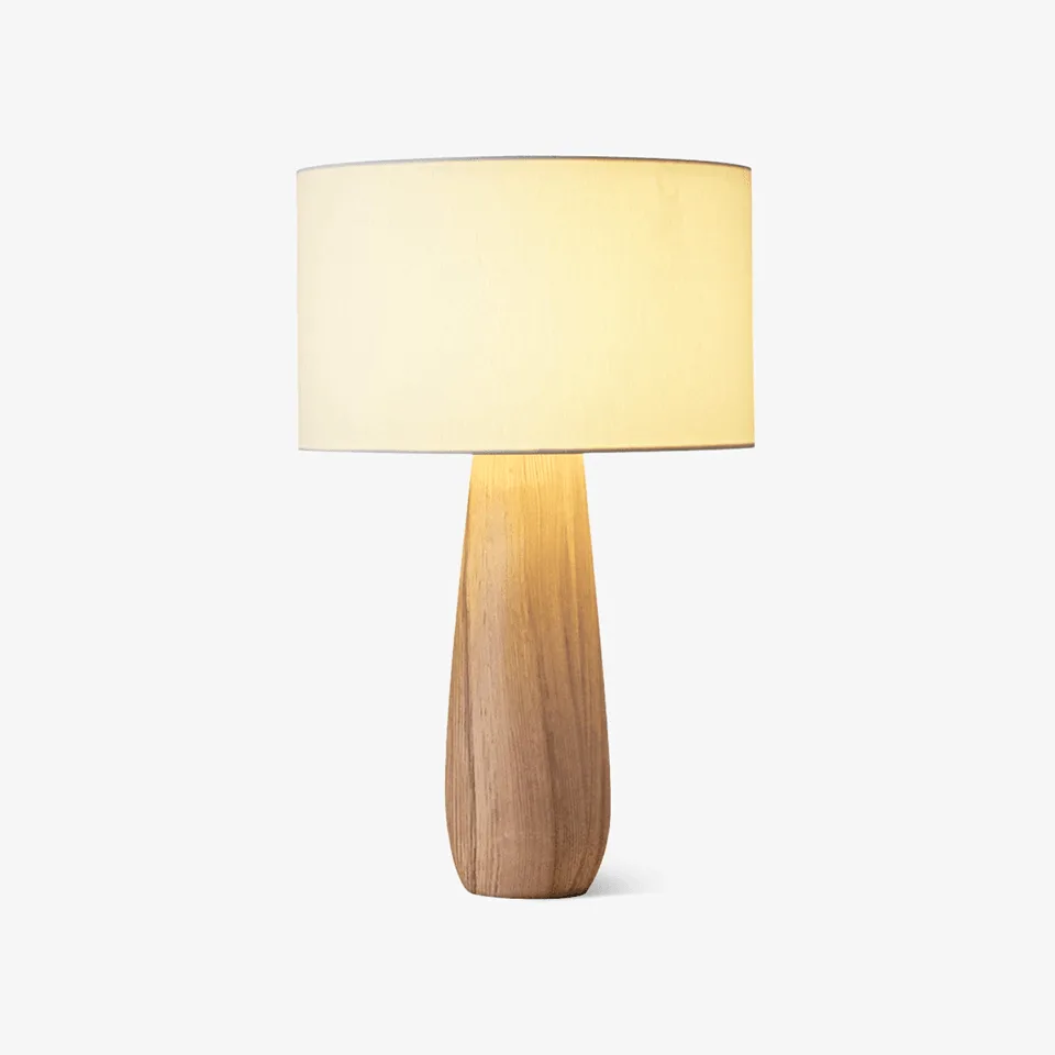 Wooden table lamp with linen shade on a tapered natural-wood base
