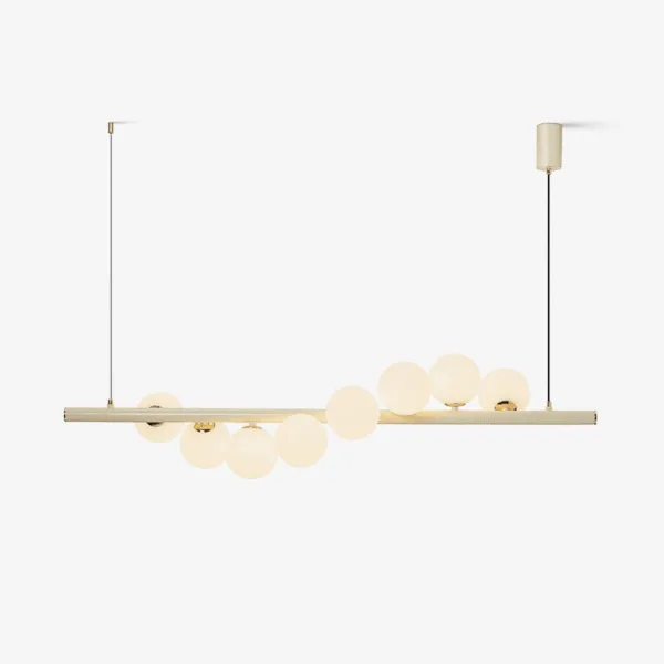 Linear glass ball chandelier with creamy yellow bar and opal borosilicate glass globes in a wave design