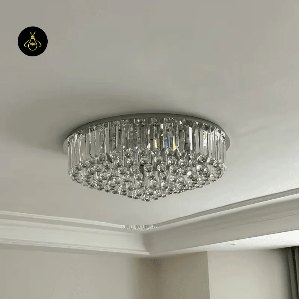Crystal Ceiling Chandelier – Round Flush-Mount K9, 6 Sizes 12 Chrome crystal flush-mount ceiling chandelier above a dining table