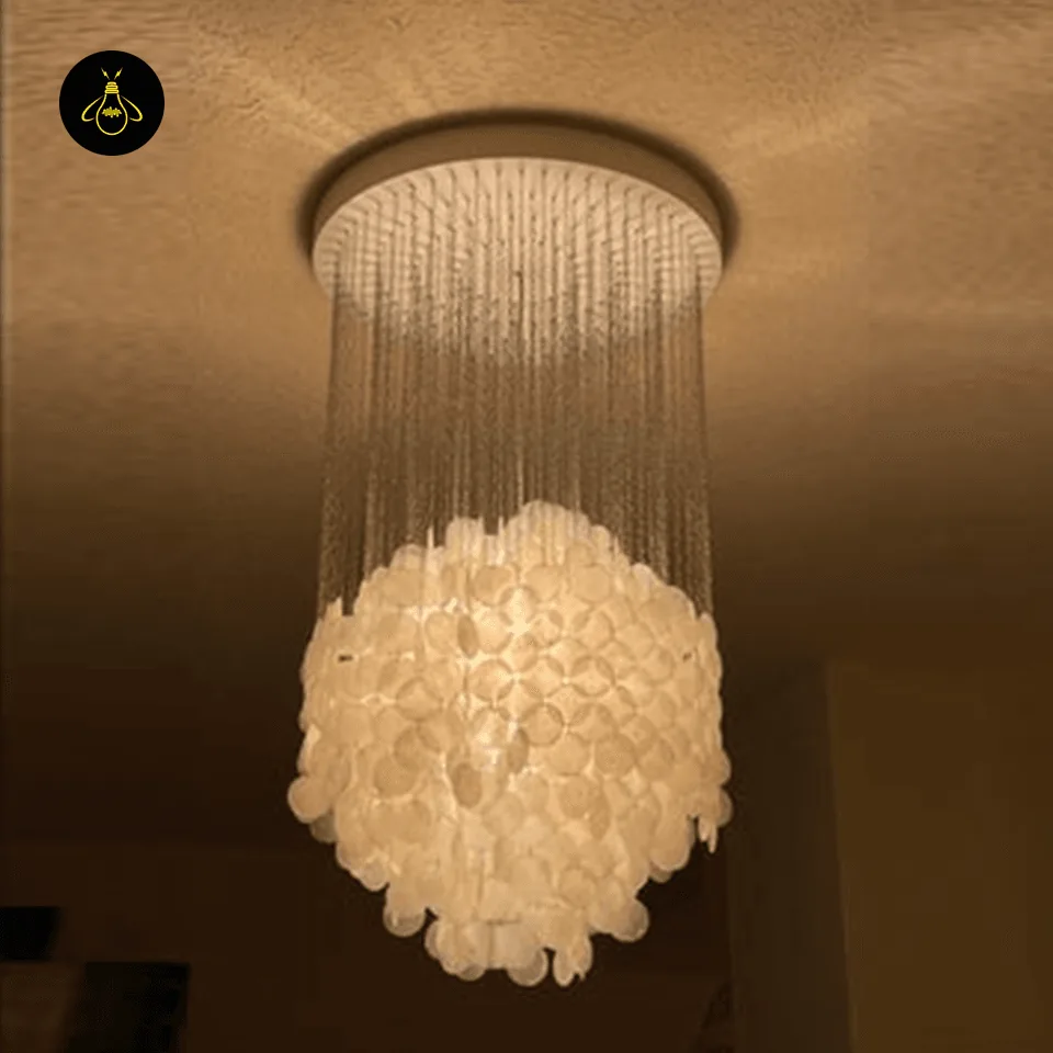 Capiz Shell Chandelier – 80 cm White Cascade of Iridescent Shells 2 Capiz shell chandelier in a coastal-inspired living room