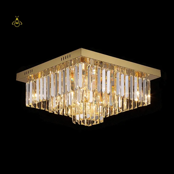 Satin gold crystal chandelier installed in a modern living room