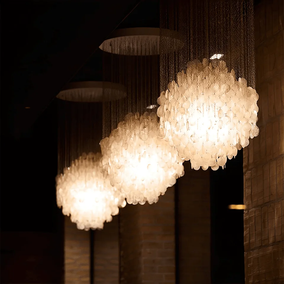 Capiz Shell Chandelier – 80 cm White Cascade of Iridescent Shells 5 Capiz shell chandelier glowing with warm Edison-style bulbs