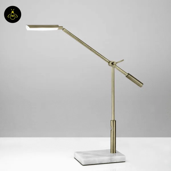Antique brass desk lamp casting warm directional LED task light