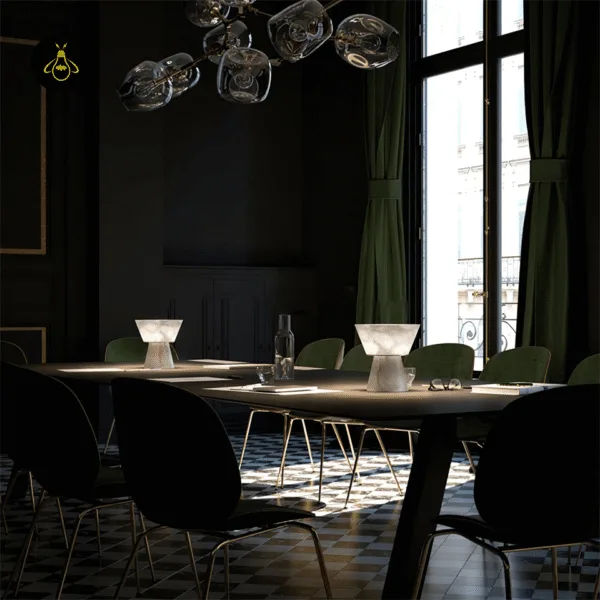 Two alabaster mushroom table lamps glowing on a long dining table