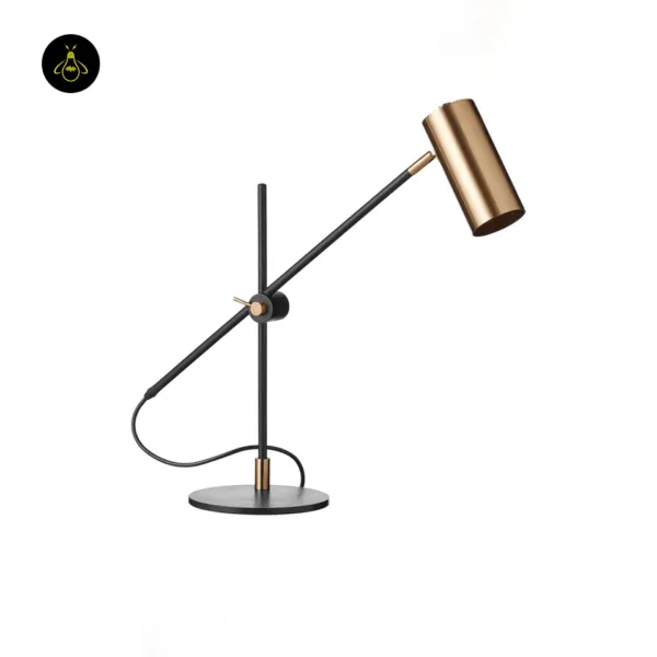 Adjustable brass desk lamp showing the heavy round base for stability
