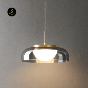 Smoky glass pendant light glowing with warm white LED behind an opal dome