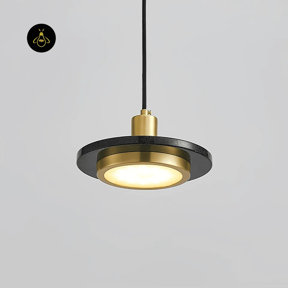 Black Marble Pendant Light – Double Circle Gold LED Drum, 20 cm 9 Black marble pendant light switched on, warm 3000K glow through the white diffuser in the gold drum