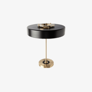 Retro round metal study table lamp in black and gold on a plain background