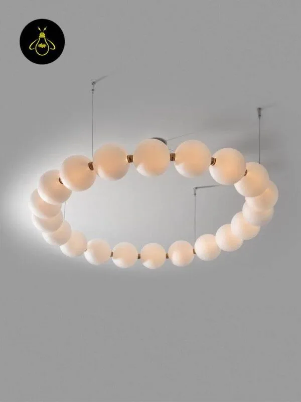 Pearl chandelier ring of warm-white milk-glass globes for a modern interior