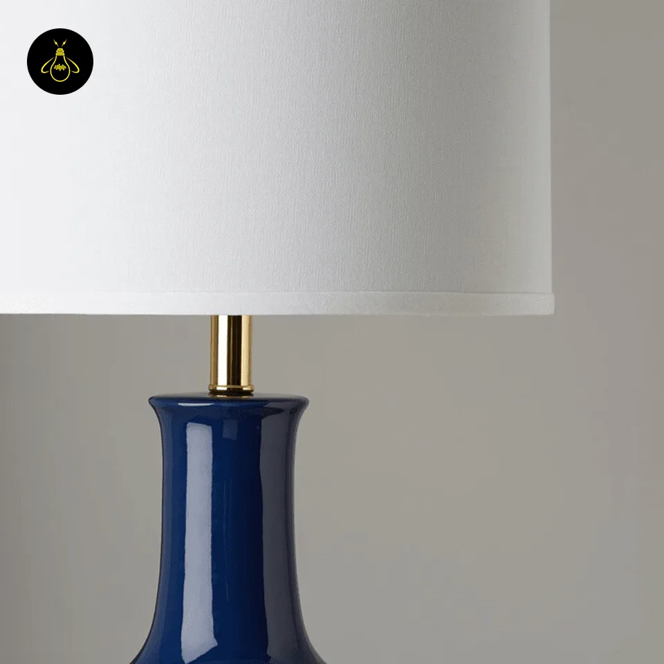 Blue and White Table Lamp – Royal-Blue Glazed Ceramic Gourd Base, 70 cm 5 Gold neck and white shade detail of a royal blue ceramic table lamp