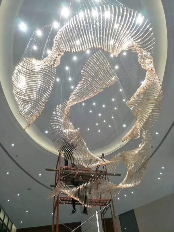 18-foot flowing crystal chandelier being installed at Grand Howrah Banquets Kolkata