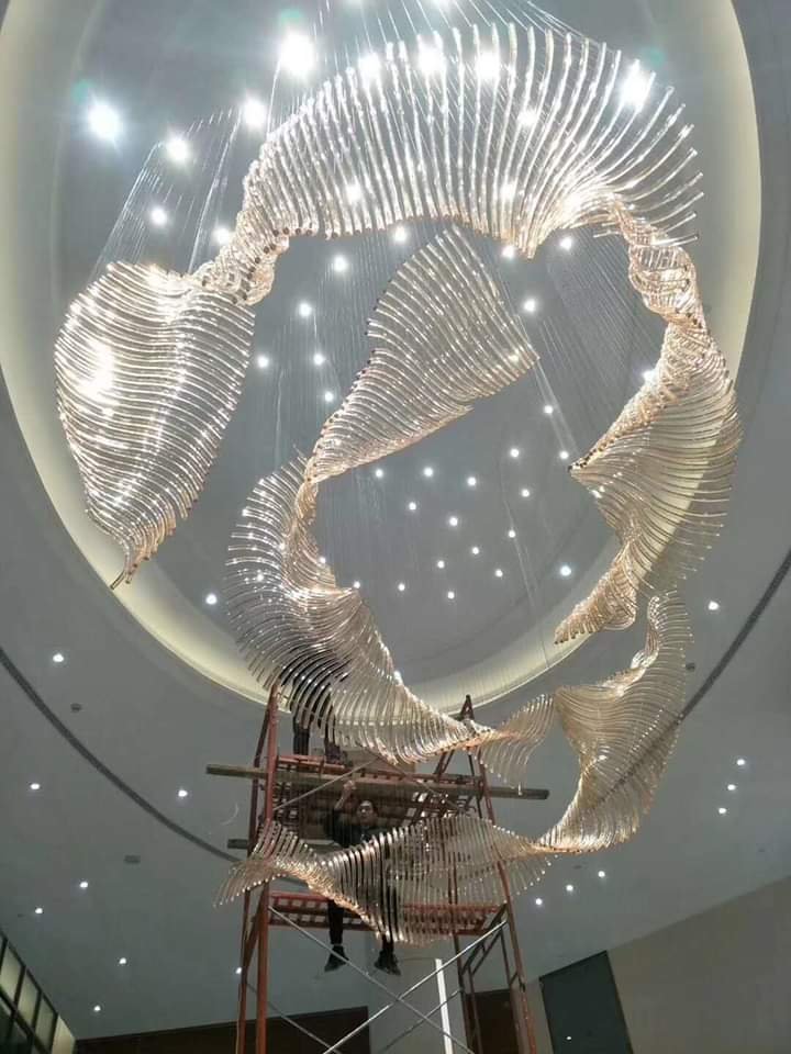 18-foot flowing crystal chandelier being installed at Grand Howrah Banquets Kolkata