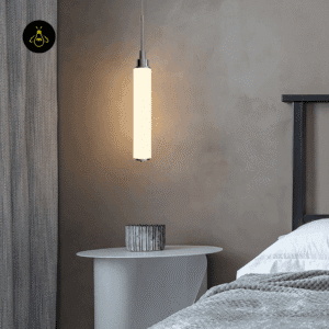 Minimalist chrome pendant light with warm white LED glow through opal glass
