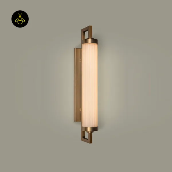 Fluted glass vanity light switched on, warm 3000K glow through the ribbed opal glass tube