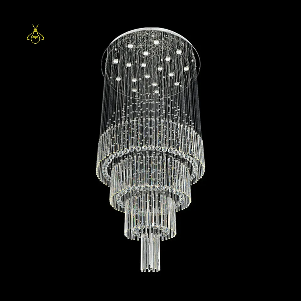 Raindrop Crystal Chandelier – Multi-Tier K9 Cascade for Staircase & Foyer 5 Round multi-tier raindrop crystal chandelier with cascading K9 crystal for a high-ceiling living room
