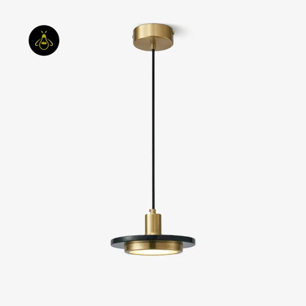 Black marble pendant light hanging from a round gold ceiling canopy on a black cord