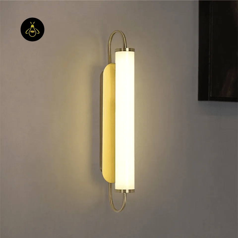Gold LED Wall Light – 50 cm Acrylic Tube Sconce for Bedside 6 Gold LED wall light installed beside a bed as a bedside sconce