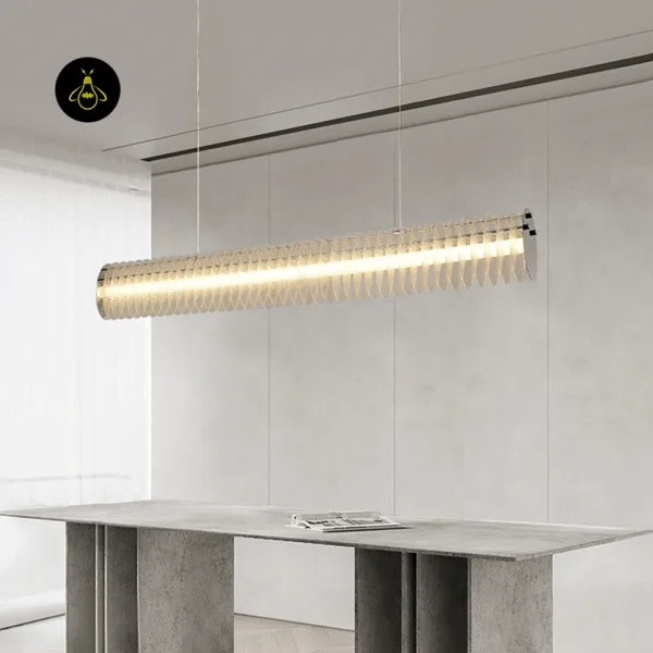 Cylindrical linear LED chandelier with ribbed acrylic discs for a kitchen island