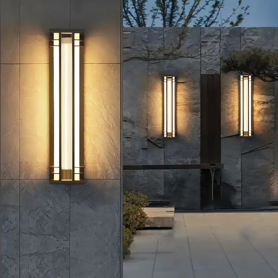 Outdoor Wall Sconce – 70 cm Tall Black & Brass IP65 LED Light 8 Tall outdoor wall sconces lighting a stone boundary wall at dusk