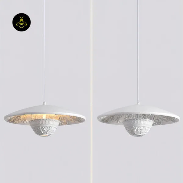 White pendant light shown lit and unlit, carved resin saucer disc and centre drum hanging on white cords