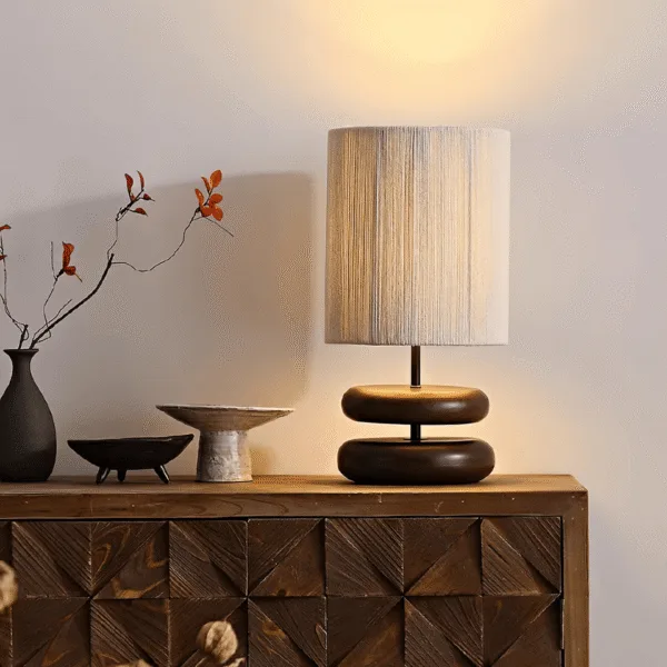 Natural wood and woven hemp rope shade on the wabi sabi table lamp