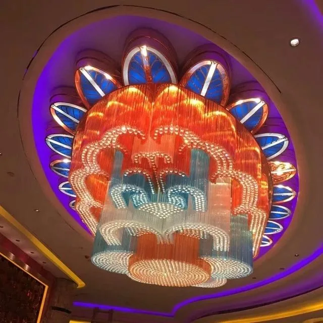 Orange and blue crystal chandelier detail showing layered suspended circular forms