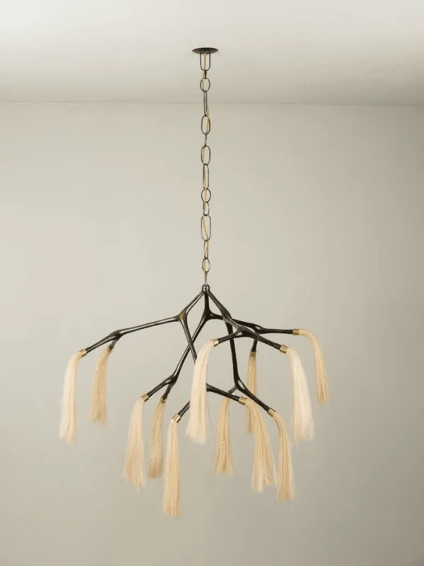 Horsehair chandelier hung on a chain from the ceiling with cascading tassels