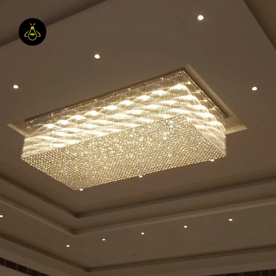 Crystal flush mount chandelier radiating light in a luxury interior project
