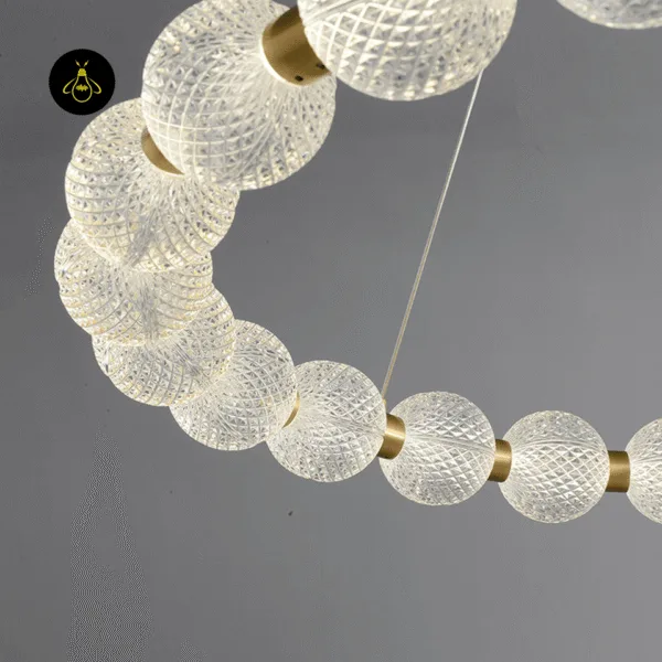 Top view of the round beaded ring chandelier with glass globe beads on a gold frame