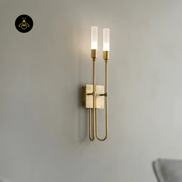 Side view of the 56 cm gold wall sconce showing the U-shaped stems and backplate depth