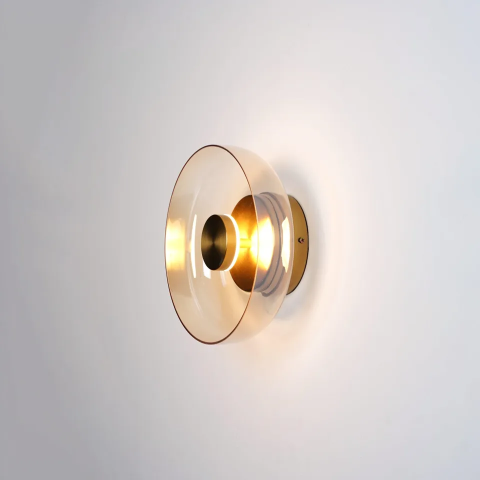 Brass LED Wall Light – Circular Solara 3000K, 23 cm 2 Circular brass LED wall light glowing warm 3000K