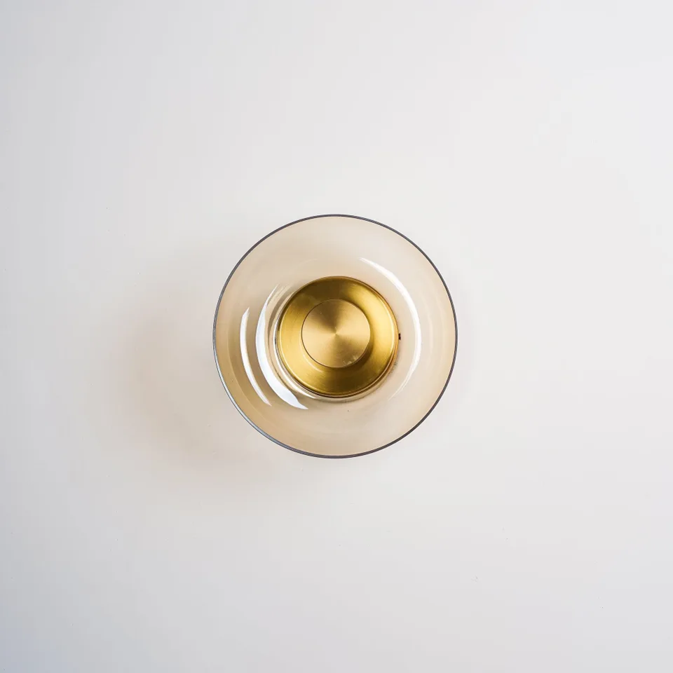 Brass LED Wall Light – Circular Solara 3000K, 23 cm 3 Brass-finish ring frame detail of the Solara wall light