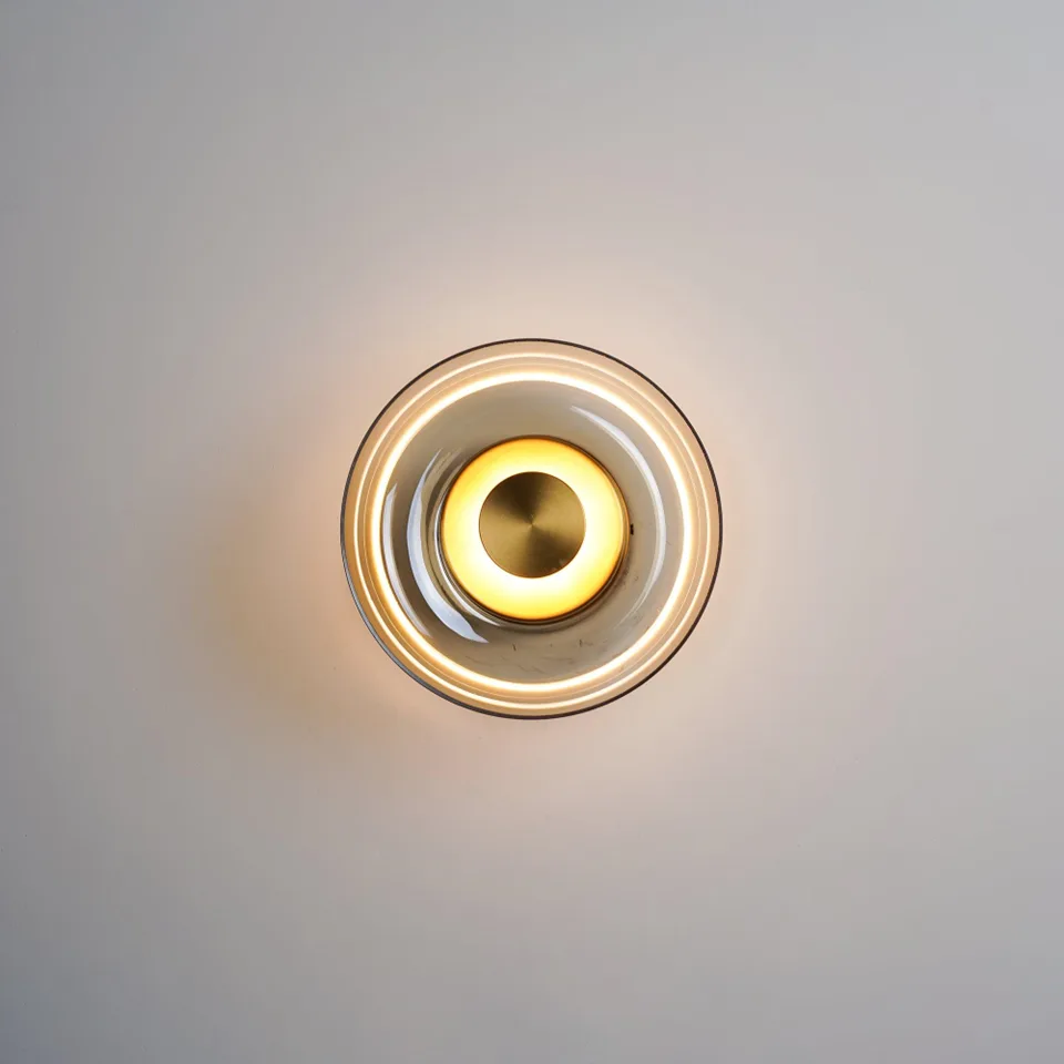 Brass LED Wall Light – Circular Solara 3000K, 23 cm 4 Clear glass shade of the circular brass LED wall light