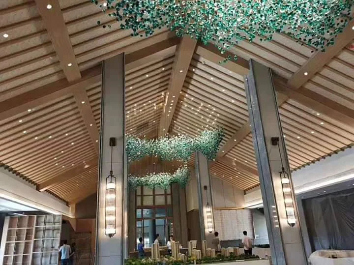 Stone-like aqua decorative ceiling light installation at The Grand Aura Hotel Jammu