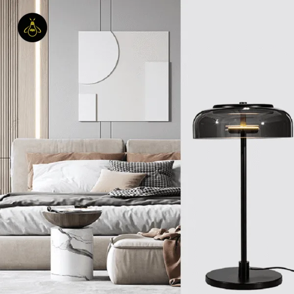 Stylish black glass dome table lamp on a nightstand in a modern interior
