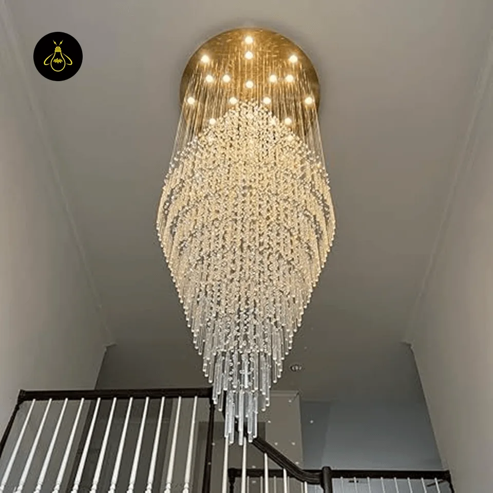 Raindrop Crystal Chandelier – Multi-Tier K9 Cascade for Staircase & Foyer 7 Long raindrop crystal chandelier in gold finish lighting a double-height staircase foyer