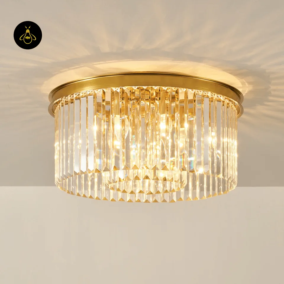 Rectangular Crystal Chandelier – Satin Gold 2-Tier Eternal Shine 21 Rectangular crystal chandelier over a dining table in satin gold