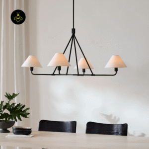 Wide white fabric chandelier with black frame styled in a contemporary interior