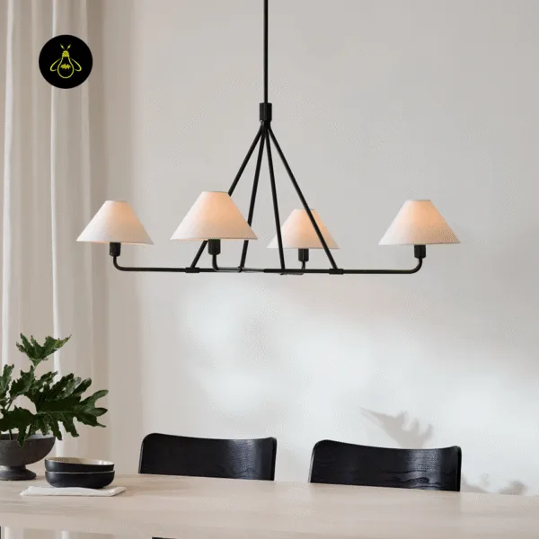 Wide white fabric chandelier with black frame styled in a contemporary interior