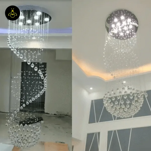 Spiral raindrop crystal chandelier illuminated in a double-height living room
