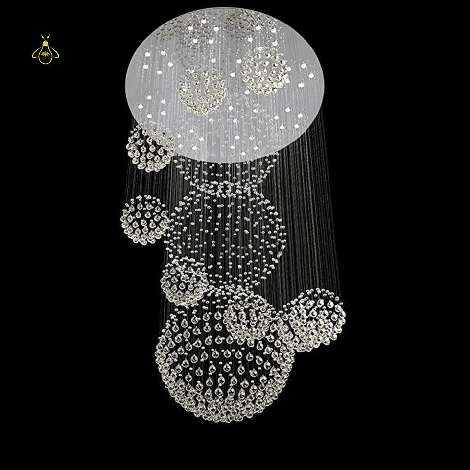 Spiral Raindrop Chandelier – Luxury Crystal Staircase & Foyer Light 4 Spiral crystal chandelier lighting a double-height foyer entrance