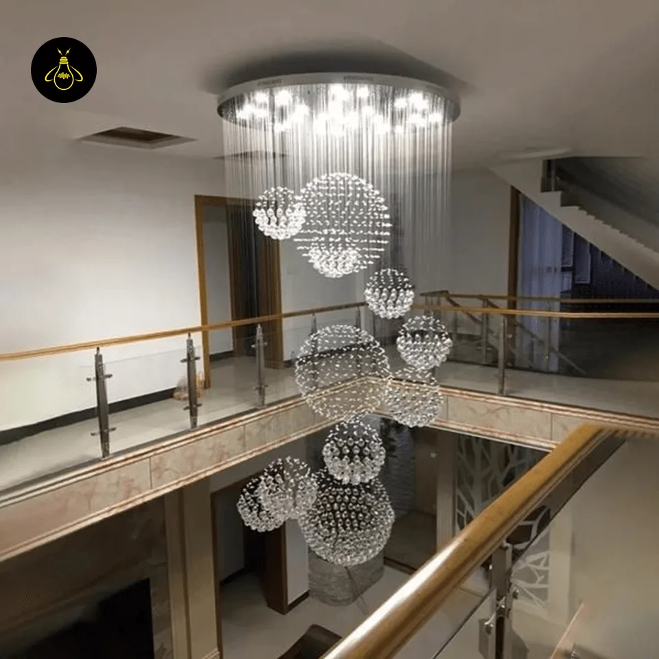 Spiral Raindrop Chandelier – Luxury Crystal Staircase & Foyer Light 5 Long spiral raindrop chandelier in a hotel lobby stairwell