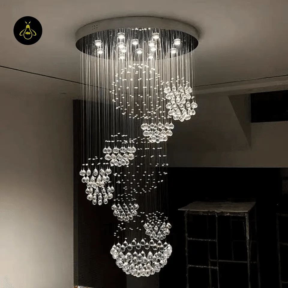 Spiral Raindrop Chandelier – Luxury Crystal Staircase & Foyer Light 6 Spiral raindrop crystal chandelier over a tall entryway with warm LED downlights