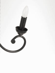 Traditional candle-style bulb used in the black pendant light