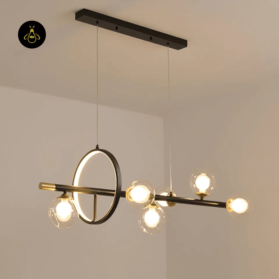 Dining Table Chandelier – 6-Globe Linear Glass & Brass Light with LED Ring, 120 cm 2 Linear glass globe dining table chandelier lit with warm white bulbs and a glowing LED ring